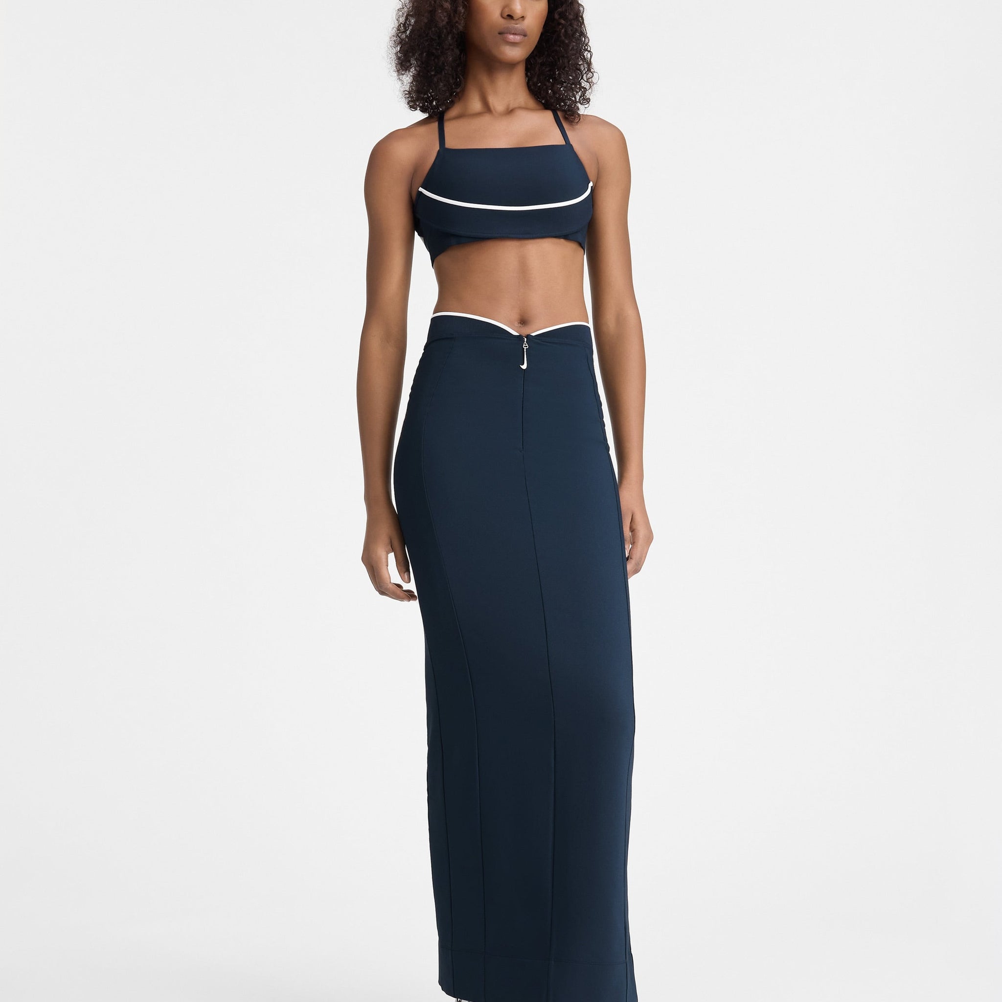 The JACQUEMUS+NIKE long skirt